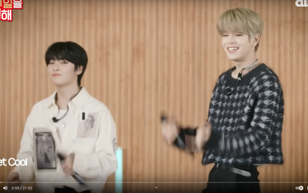 I.N and Seungmin performing Get Cool. Seungmin has soft blond hair and a cute smile. He's wearing a stupidly soft cropped sweater with black pants. His waist is *tiny* (and yes he's kind of side-on to the camera but even so omg I'm worried about him having enough space in there for all of his vital organs)